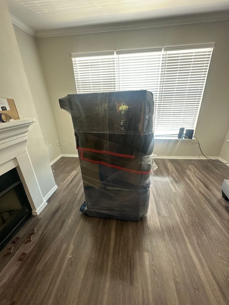 Plano TX movers loading a truck